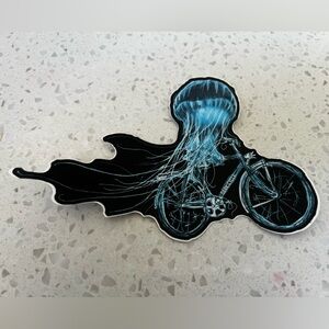 Jellyfish on a bike 6 inches by 4 inches